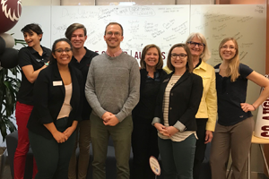 Admission's Staff joins Matt in a group photo to celebrate his Auggie Pride Award