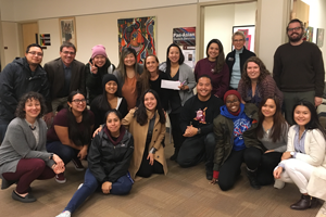 Group shot of staff and students celebrating the award for the Multicultural Student Services